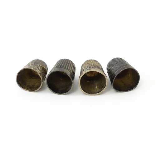 330 - Four assorted silver thimbles to include an example hallmarked Birmingham 1901 maker Henry Griffith ... 