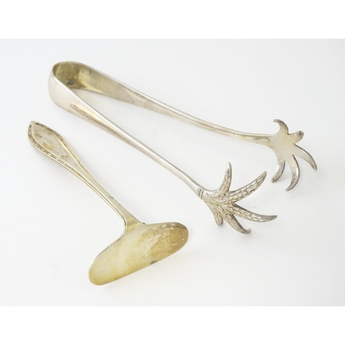 350 - A quantity of assorted silver items to include ice tongs hallmarked Sheffield 1912, maker Joseph Rod... 