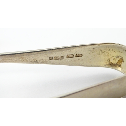350 - A quantity of assorted silver items to include ice tongs hallmarked Sheffield 1912, maker Joseph Rod... 