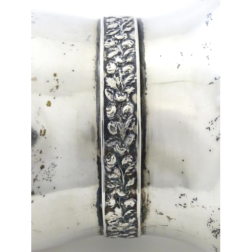 356 - A silver plate and white metal vase of ovoid form with banded floral decoration, indistinct marks un... 