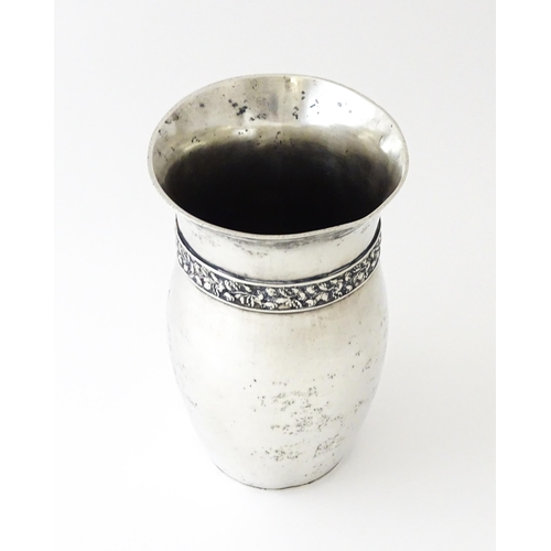 356 - A silver plate and white metal vase of ovoid form with banded floral decoration, indistinct marks un... 