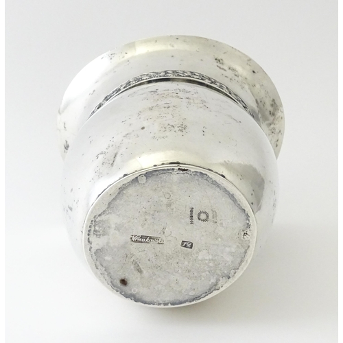 356 - A silver plate and white metal vase of ovoid form with banded floral decoration, indistinct marks un... 