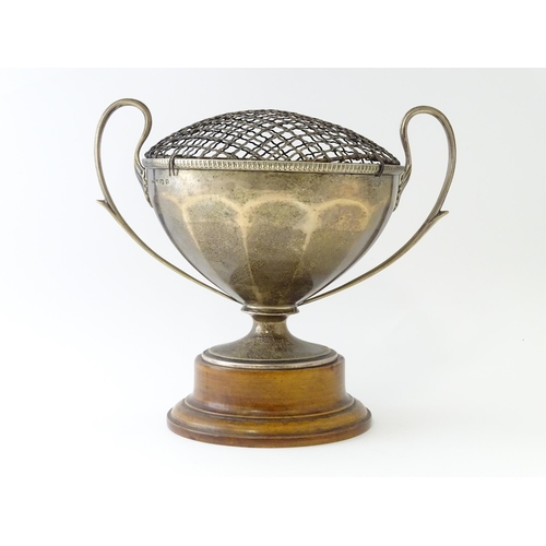 544 - A silver pedestal twin handled trophy cup / rose bowl hallmarked Birmingham 1921, maker Collingwood ... 