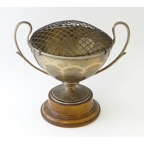 544 - A silver pedestal twin handled trophy cup / rose bowl hallmarked Birmingham 1921, maker Collingwood ... 