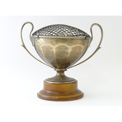 544 - A silver pedestal twin handled trophy cup / rose bowl hallmarked Birmingham 1921, maker Collingwood ... 