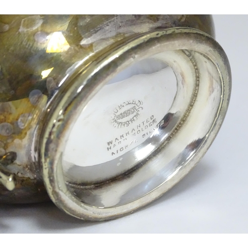 588 - Three items of silver plate comprising a salver, punch bowl and a sauce boat. Salver approx. 13