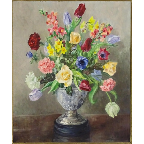 1675 - K. M. Robson, 20th century, Oil on board, A still life study of spring flowers in a pedestal vase. S... 