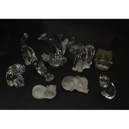 306 - Seven Lenox glass paperweights to include stretching cat, elephant, dolphin, seated cat, etc. Togeth... 