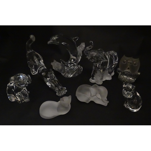 306 - Seven Lenox glass paperweights to include stretching cat, elephant, dolphin, seated cat, etc. Togeth... 