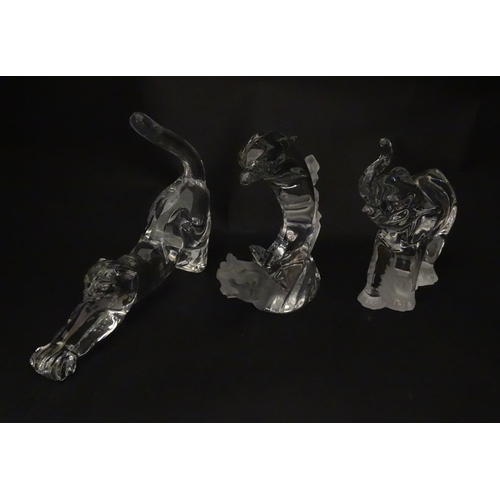 306 - Seven Lenox glass paperweights to include stretching cat, elephant, dolphin, seated cat, etc. Togeth... 