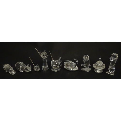 311 - A quantity of assorted Swarovski crystal ornaments to include rhino, swans, hedgehog, snail, elephan... 