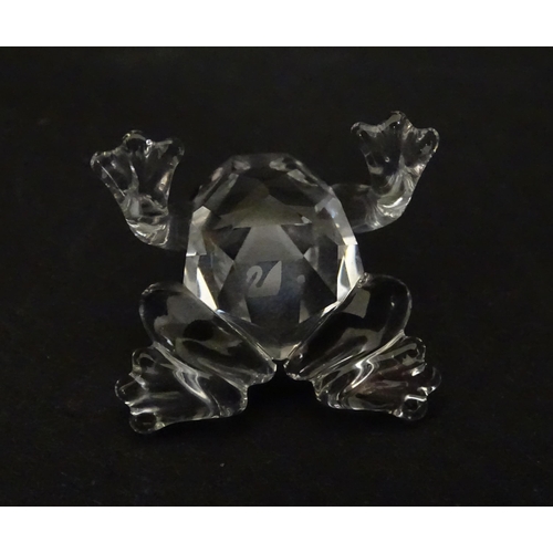 311 - A quantity of assorted Swarovski crystal ornaments to include rhino, swans, hedgehog, snail, elephan... 