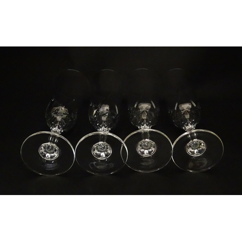 318 - A set of eight glass champagne flutes. Approx. 8