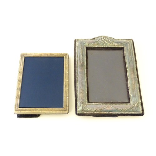 553 - Two easel back photograph frames with silver surrounds, one hallmarked Sheffield 1992, maker Carrs o... 