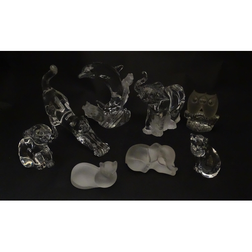 306 - Seven Lenox glass paperweights to include stretching cat, elephant, dolphin, seated cat, etc. Togeth... 