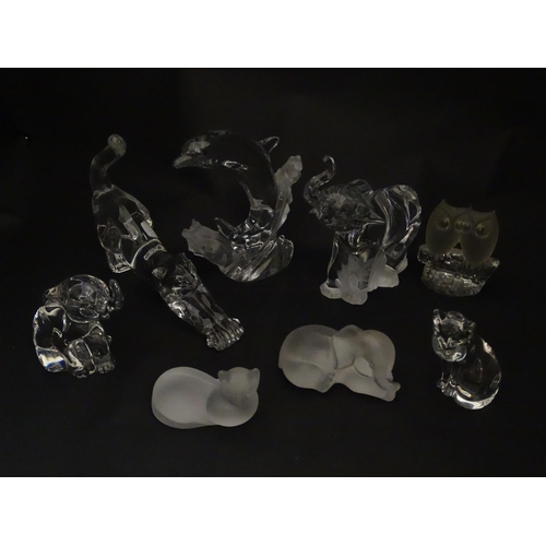 306 - Seven Lenox glass paperweights to include stretching cat, elephant, dolphin, seated cat, etc. Togeth... 