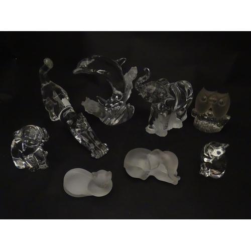 306 - Seven Lenox glass paperweights to include stretching cat, elephant, dolphin, seated cat, etc. Togeth... 