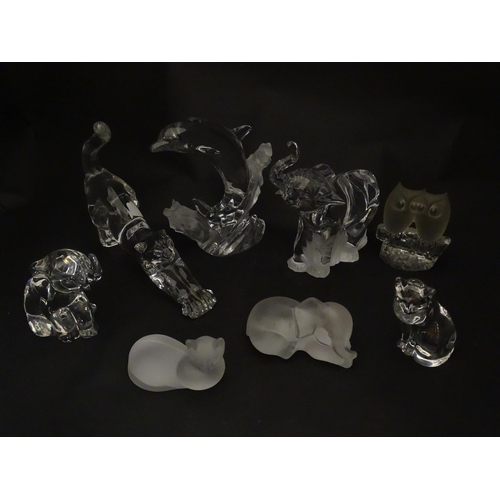 306 - Seven Lenox glass paperweights to include stretching cat, elephant, dolphin, seated cat, etc. Togeth... 