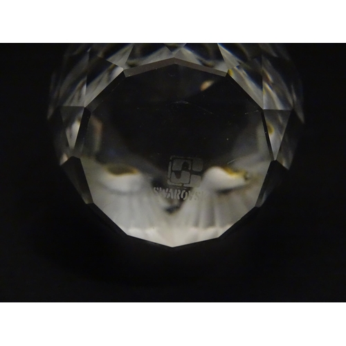 311 - A quantity of assorted Swarovski crystal ornaments to include rhino, swans, hedgehog, snail, elephan... 