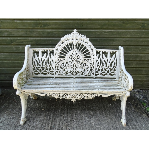 815 - Garden / Architectural : A late 19th / early 20thC cast iron garden bench with foliate decoration an... 