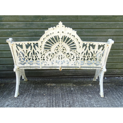 815 - Garden / Architectural : A late 19th / early 20thC cast iron garden bench with foliate decoration an... 