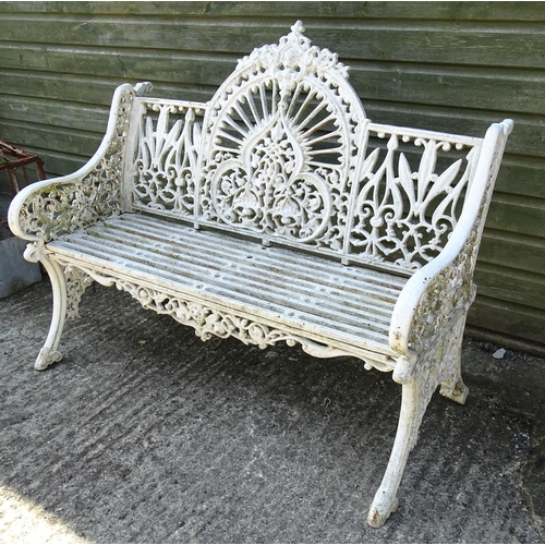 815 - Garden / Architectural : A late 19th / early 20thC cast iron garden bench with foliate decoration an... 