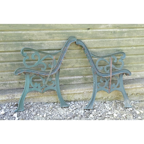 817 - Garden / Architectural : Four cast iron bench frame ends, with scroll decoration and green painted f... 