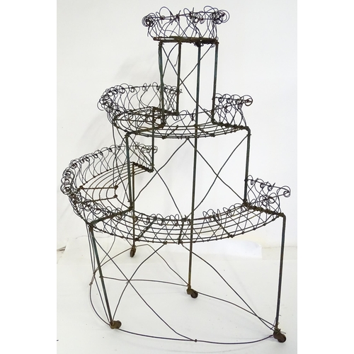 819 - Garden / Architectural : a Regency style wirework flower rack, of demi lune form in three tiers supp... 