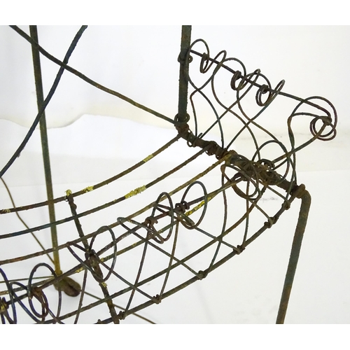 819 - Garden / Architectural : a Regency style wirework flower rack, of demi lune form in three tiers supp... 