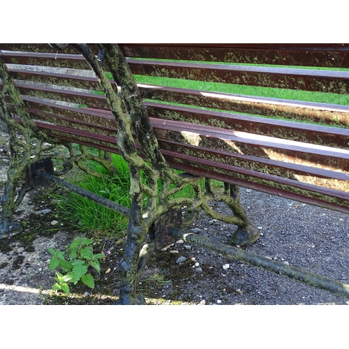 825 - Garden / Architectural: a 19thC cast iron garden bench, the three supports / ends formed as branches... 