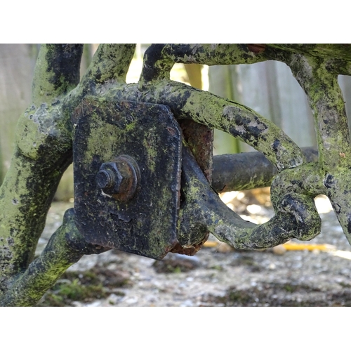 825 - Garden / Architectural: a 19thC cast iron garden bench, the three supports / ends formed as branches... 