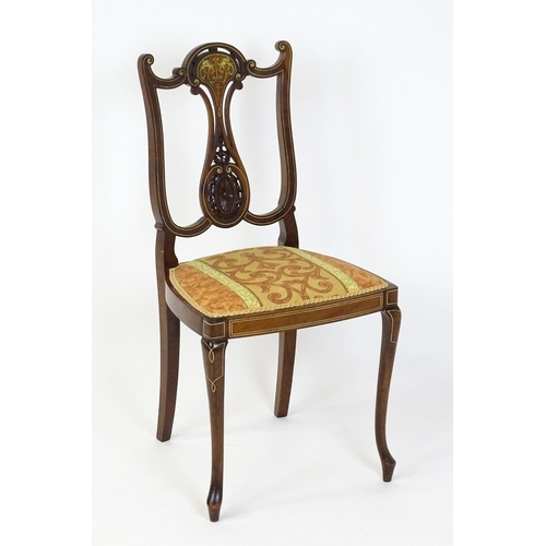 1625 - An Edwardian mahogany side chair with satinwood and bone inlay above a central splat with a carved f... 