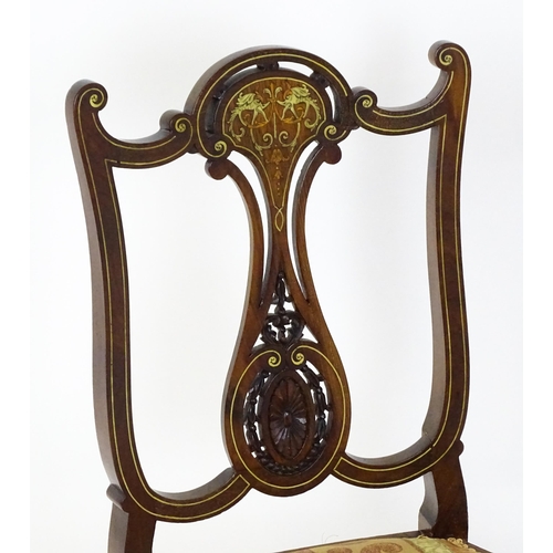 1625 - An Edwardian mahogany side chair with satinwood and bone inlay above a central splat with a carved f... 