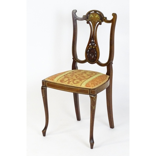 1625 - An Edwardian mahogany side chair with satinwood and bone inlay above a central splat with a carved f... 