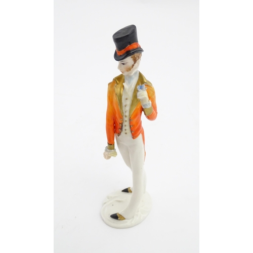 137 - A 20thC Italian Silvio Righetto figure modelled as a gentleman wearing a frock coat and a top hat. M... 