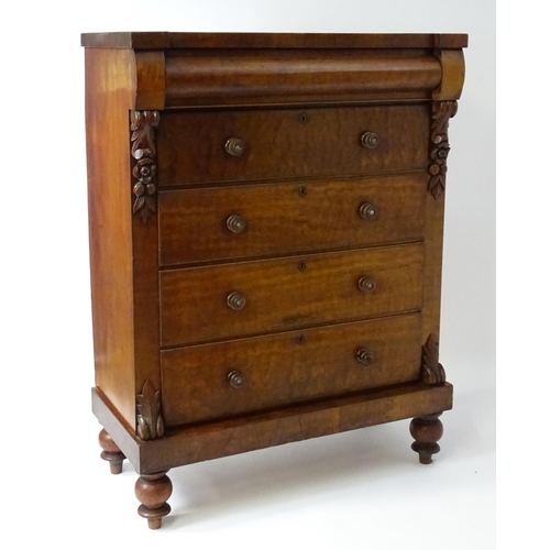 1618 - A Victorian North Country chest of drawers of large proportions, the chest having a cushion drawer a... 