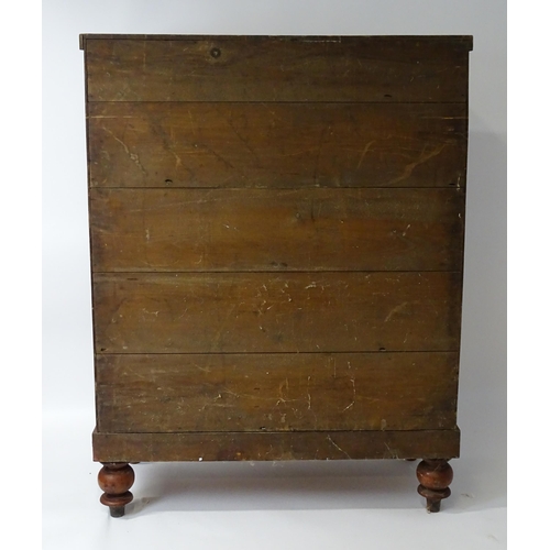 1618 - A Victorian North Country chest of drawers of large proportions, the chest having a cushion drawer a... 