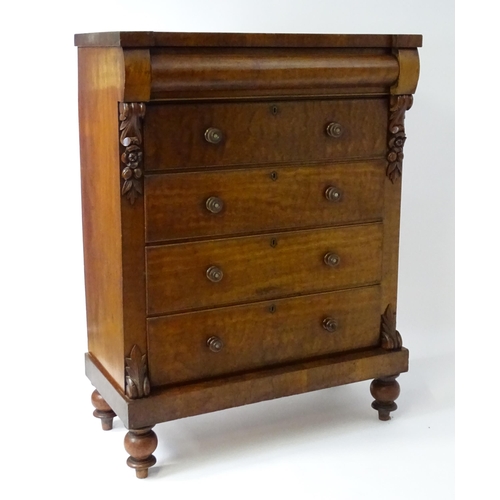 1618 - A Victorian North Country chest of drawers of large proportions, the chest having a cushion drawer a... 