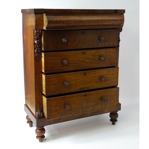 1618 - A Victorian North Country chest of drawers of large proportions, the chest having a cushion drawer a... 