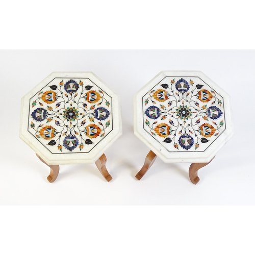 1628 - A pair of marble topped tables with octagonal pietra dura style tops. 12