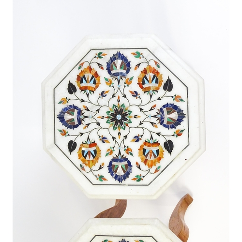 1628 - A pair of marble topped tables with octagonal pietra dura style tops. 12