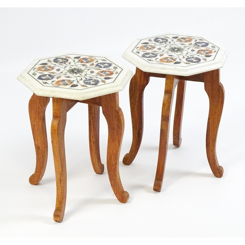 1628 - A pair of marble topped tables with octagonal pietra dura style tops. 12