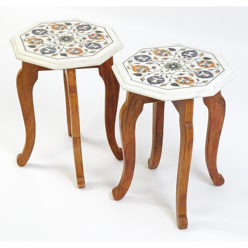 1628 - A pair of marble topped tables with octagonal pietra dura style tops. 12