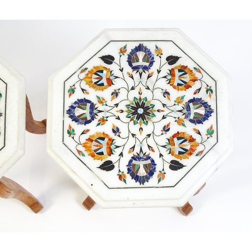 1628 - A pair of marble topped tables with octagonal pietra dura style tops. 12