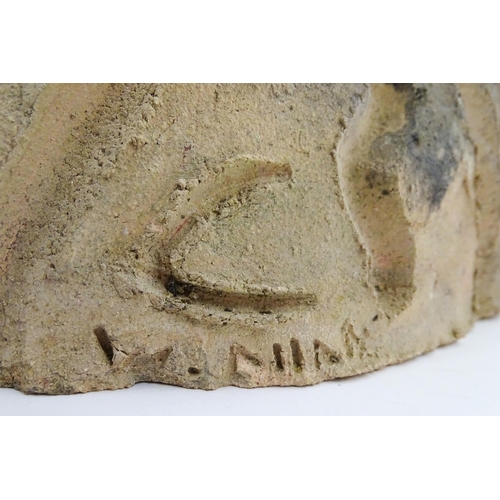 192 - A 20thC ceramic sculpture modelled as a female nude torso. Indistinctly signed W. Aman lower. Approx... 