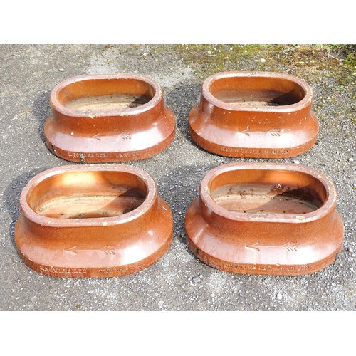 830 - Four early 20thC salt glazed planters of oval form with arrow detail, and stamped Knowles Ltd. Darwe... 