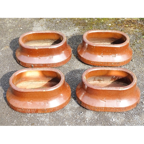 830 - Four early 20thC salt glazed planters of oval form with arrow detail, and stamped Knowles Ltd. Darwe... 