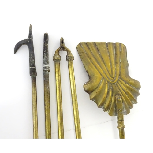 1657 - Four 19thC brass fire tools, comprising shovel, poker, tongs and hook. The largest approx 25