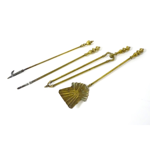 1657 - Four 19thC brass fire tools, comprising shovel, poker, tongs and hook. The largest approx 25