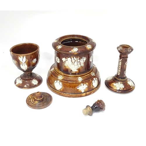 55 - A Victorian Measham bargeware smoker's compendium comprising candlestick, goblet, tobacco jar and ta... 